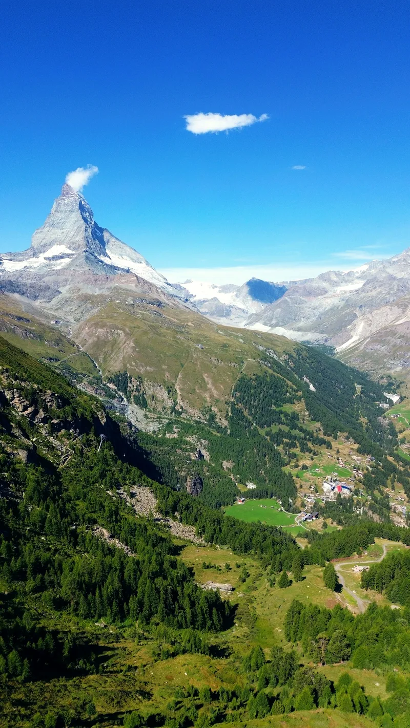 The Matterhorn above the larch slopes and valley floor at Zermatt