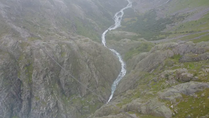 A glacial river threading the rock gorge below the Trift bridge, Switzerland