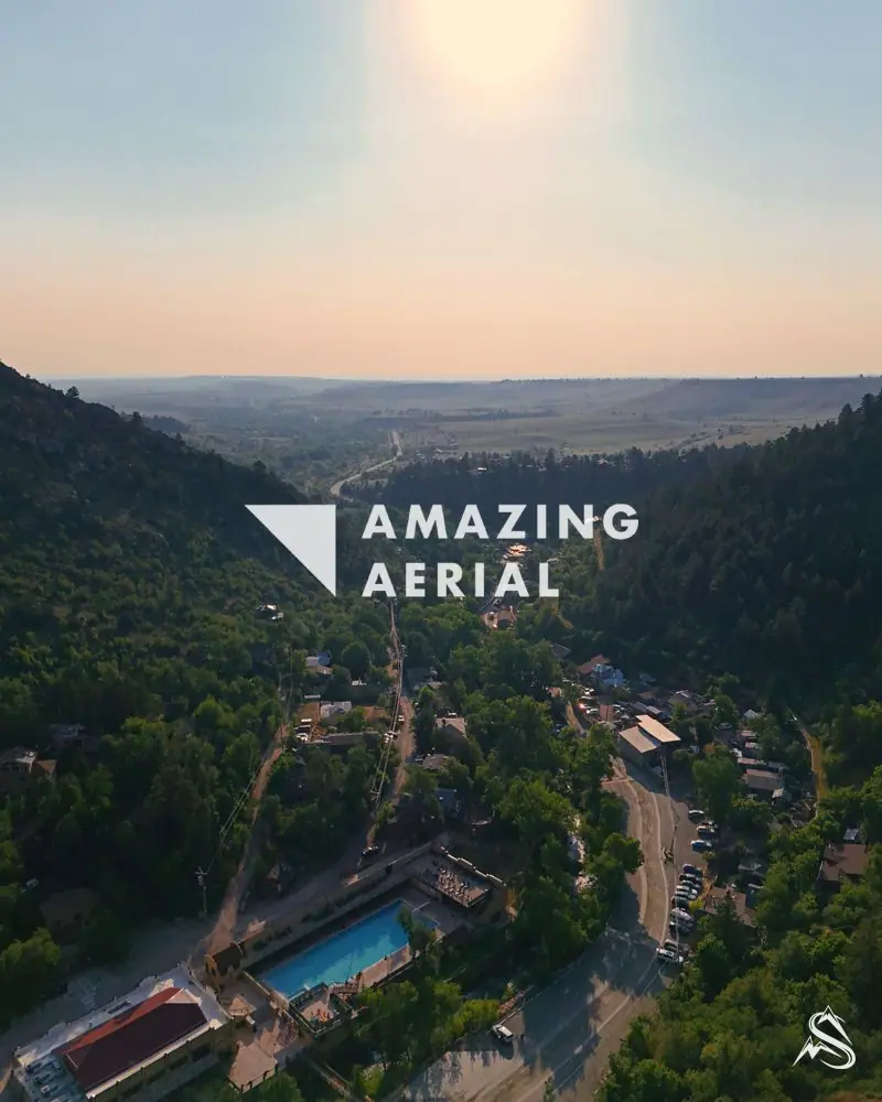 The Eldorado Springs resort and its pool at the mouth of the canyon, the village road beyond