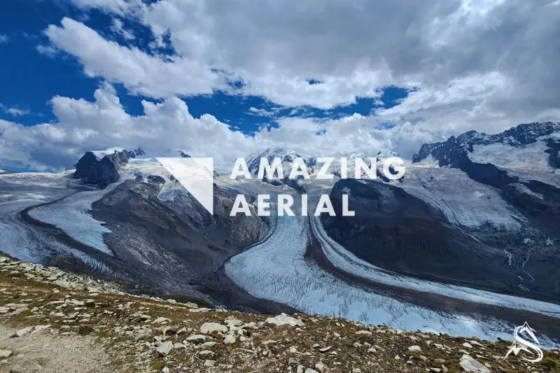 The Gorner Glacier curving down its valley from the Monte Rosa snowfields under heavy cloud