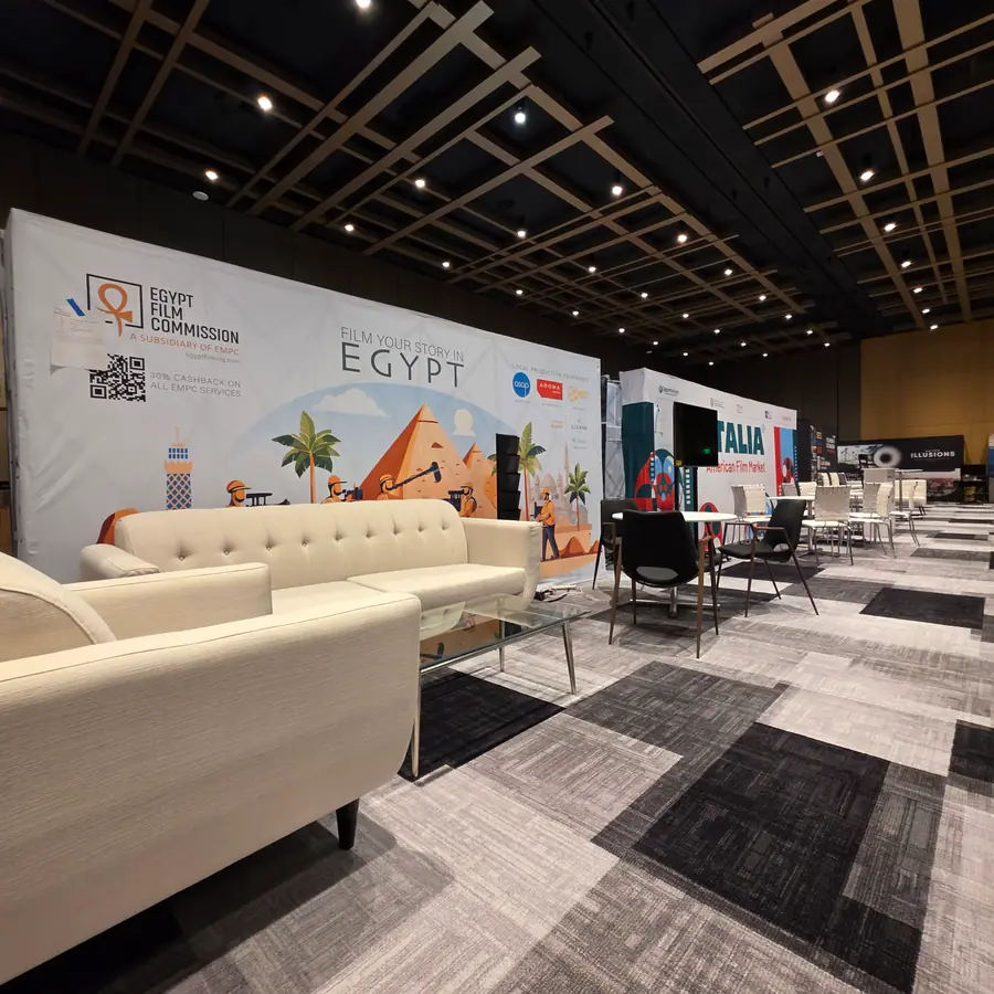 A row of exhibitor booths at American Film Market, including a banner for the Egypt Film Commission promoting local production incentives.