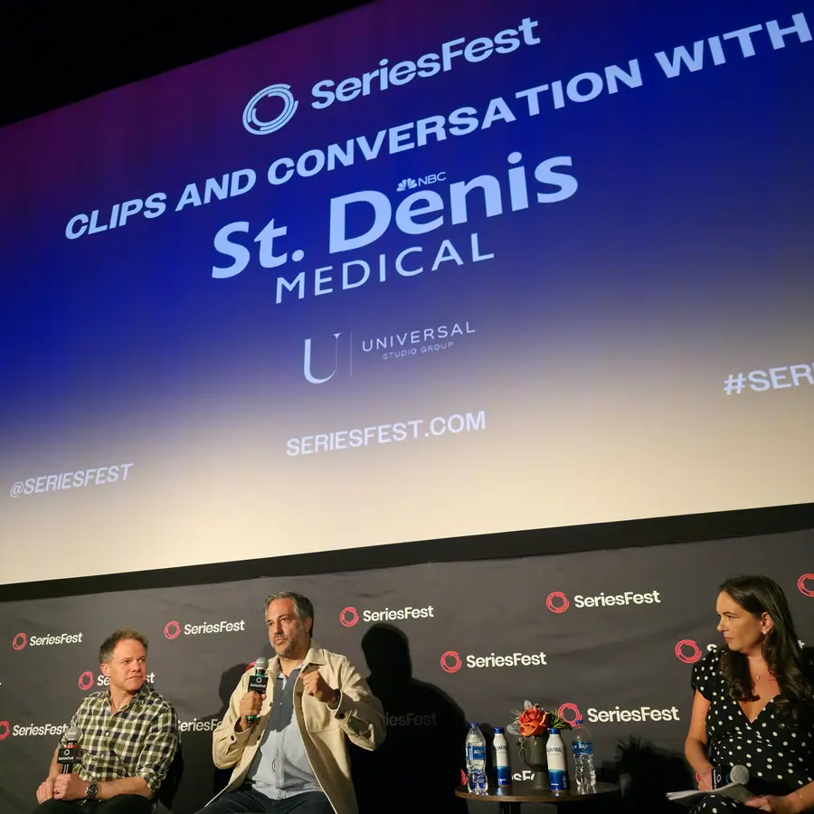 A panel on the SeriesFest stage under a screen reading “Clips and Conversation with St. Denis Medical.”