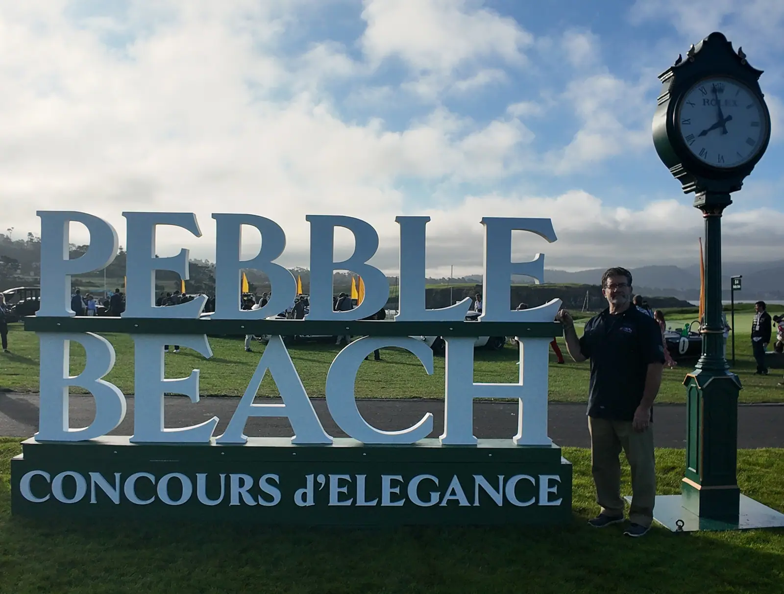 The Pebble Beach Concours d'Elegance lettering and clock at the entrance